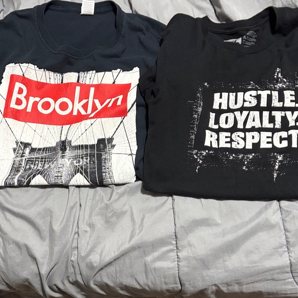 Graphic T-Shirts 2 men’s small Wwe and fruit of the loom
